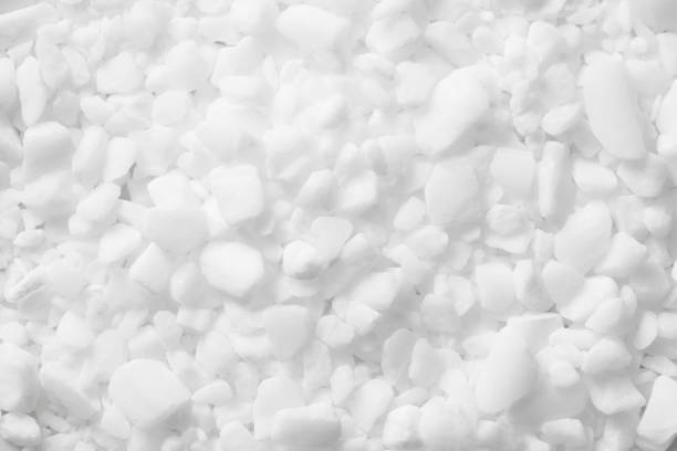 Coarse grain salt. Dishwasher salt texture. Granulated crystalline sodium chloride. Closeup grains. White granules background. Chemistry dry additive. Granular closeup. hydroxide stock pictures, royalty-free photos & images