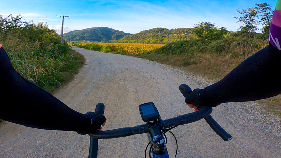 Riding a gravel bike, rider point of view, on a gravel road in Girona, main place to ride it