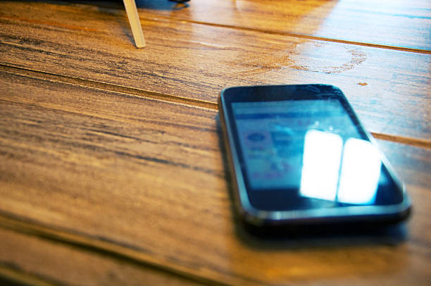 istock dirty desk in a bar with mobile on it 177595894