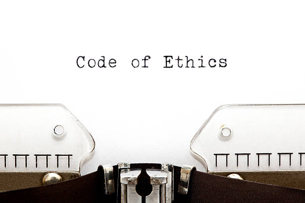 Code of Ethics Typewriter Code of Ethics printed on an old typewriter. code of ethics stock pictures, royalty-free photos & images