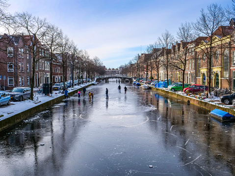 View on the frozen canal , the Herengracht, Leiden. City of Rembrandt. The Netherlands.