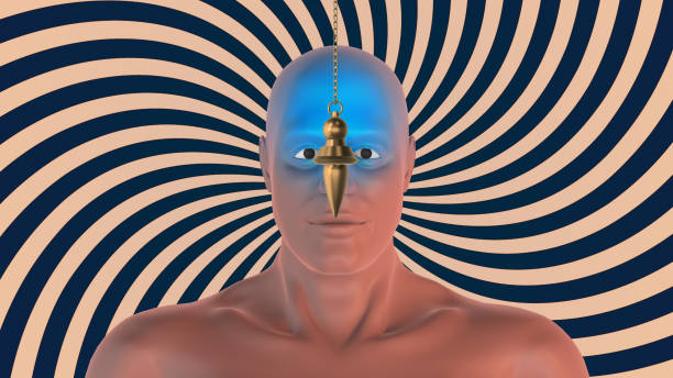 hypnose humaine avec un pendule et un chakra - hypnotist therapy alternative therapy alternative medicine photos et images de collection