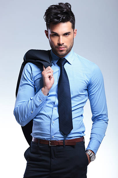 istock business man with jacket on shoulder 177598092