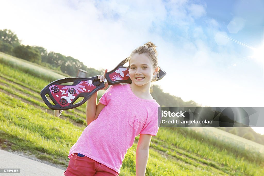 Fille avec vague repasser - Photo de Activité de loisirs libre de droits