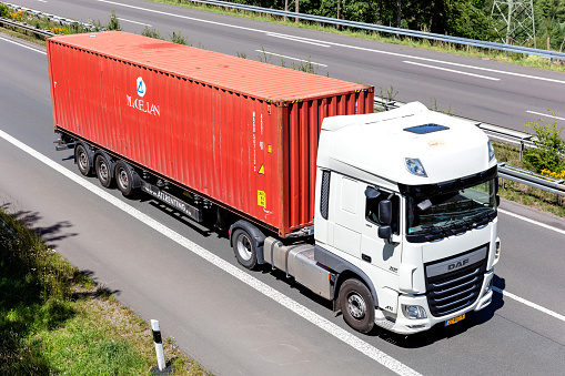 Wiehl, Germany - June 26, 2020: ATL Renting DAF XF truck with Magellan container on motorway