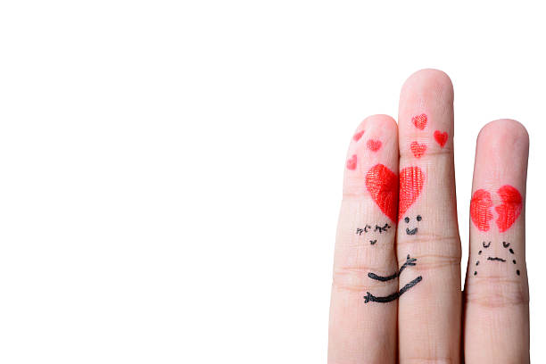 istock happy couple in love with painted smiley and hugging 177599731