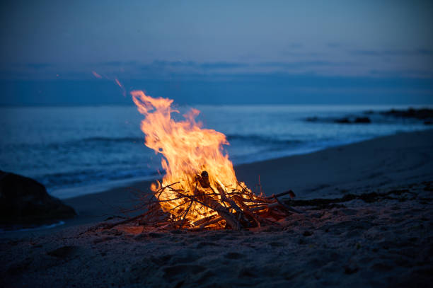 istock A campfire burns on a deserted sandy beach at the seashore in the evening 1776010005