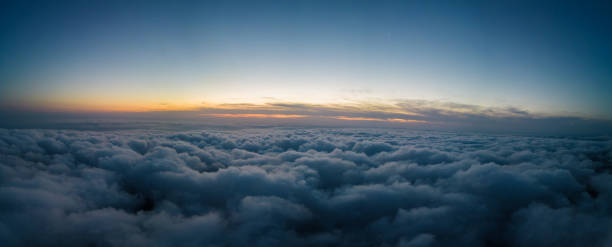 istock A drone flies over fluffy clouds at sunset. The drone flies through the clouds, creating a sense of wonder and awe 1776010580