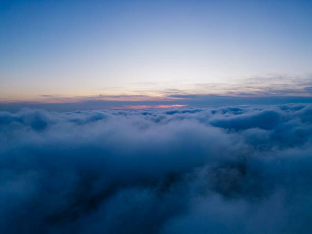 istock A drone flies over fluffy clouds at sunset. The drone flies through the clouds, creating a sense of wonder and awe 1776010582