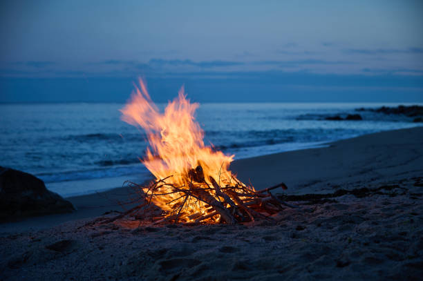 istock A campfire burns on a deserted sandy beach at the seashore in the evening 1776011115
