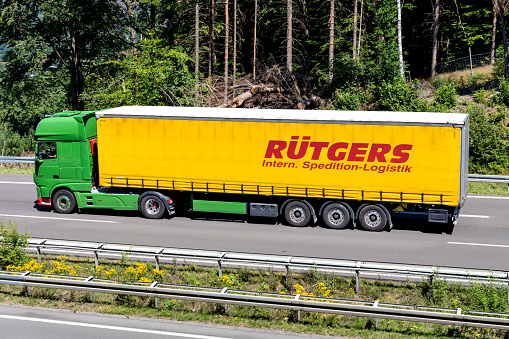 Wiehl, Germany - June 26, 2020: Rüttgers DAF XF truck with curtainside trailer on motorway