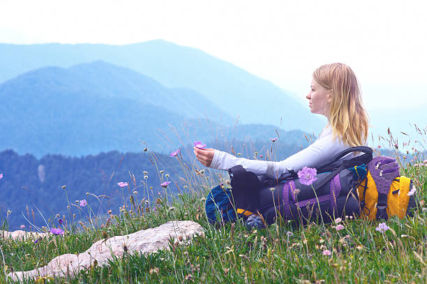 istock Woman Traveller relaxing with Mountains on Background 177602292