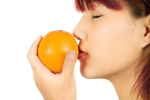 istock Young asian woman with an orange 177602776