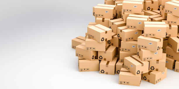 Cardboard boxes on white background with empty copy space on left side, logistics and delivery concept stock photo