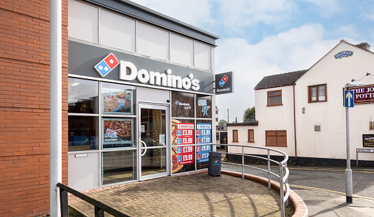 Newcastle-under-Lyme, Staffordshire-united kingdom october 14, 2023The frontage of Dominos Pizza take away
