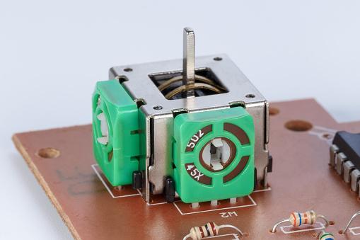 Two-axis joystick device based on potentiometers.Side view, close-up