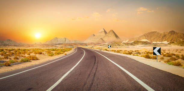 istock Panorama of road and pyramids 1776072062