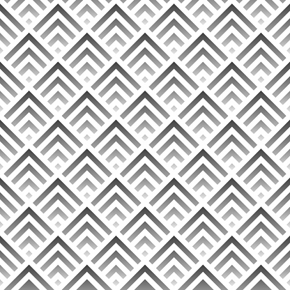 This image displays an orderly and crisp chevron pattern in varying shades of gray, forming a seamless and harmonious geometric tessellation. The interplay of light and dark shades adds depth and dimension to the design, making it versatile for sophisticated graphic projects, interior decor, or stylish fashion textiles. The pattern's simplicity is balanced by the visual complexity of the tessellation, offering a clean yet engaging aesthetic.