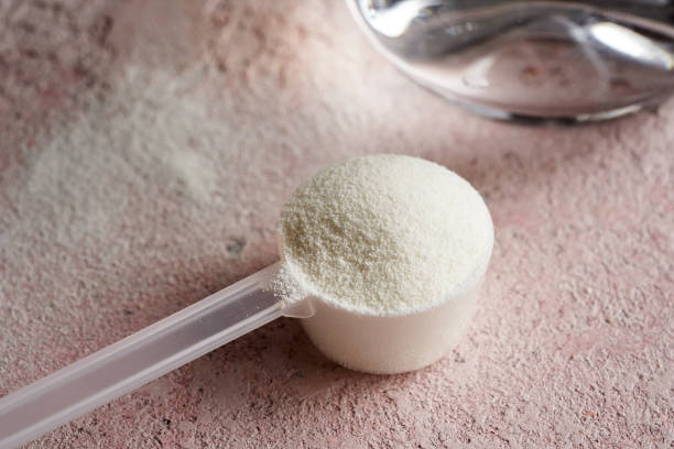 istock Collagen powder in a plastic scoop on a table 1776134184
