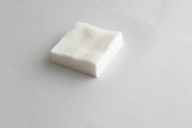istock Stack of sterile gauze pad on dark background 1776170386