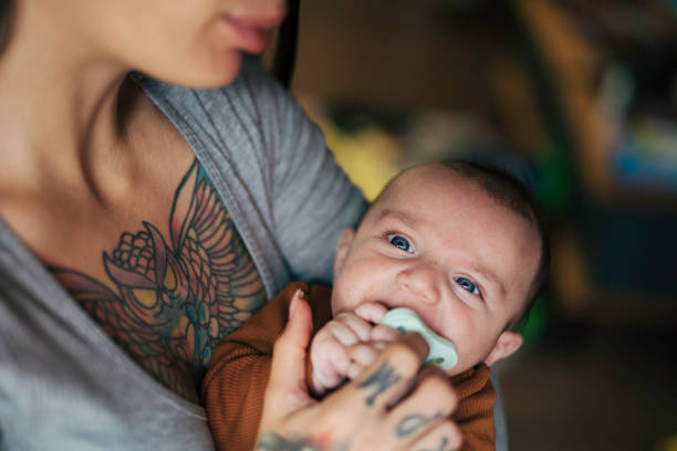 istock Top view of mother and baby with pacifier 1776187268