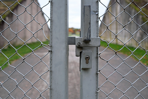Closed and locked metal gate