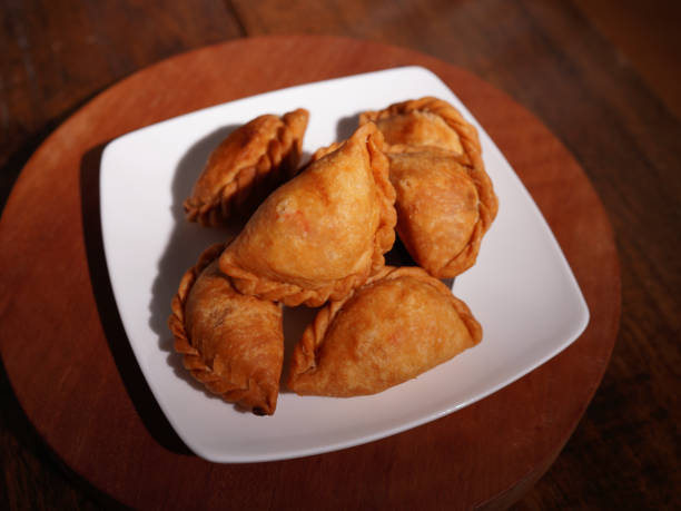 istock Curry puff snacks Traditional Thai desserts On the wooden table 1776226958