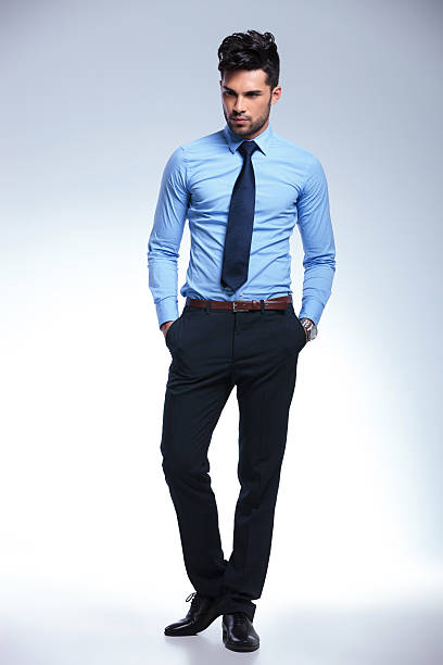 istock business man without jacket with hands in pocket 177623663
