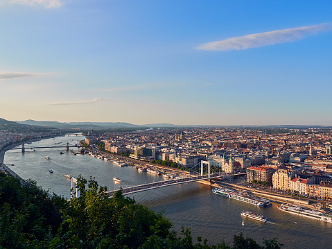 A panoramic view from Citadella to Pest side of Budapest. From forefront to background: Elisabeth bridge (Erzsébet híd), Chain bridge (Széchenyi Lánchíd) and Margaret Bridge (Margit híd). Lets mention St. Stephan cathedral and The Parliament building as 2 from many visible landmarks.