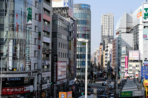 View of a busy street in the Shinjuku district of Tokyo, Japan.