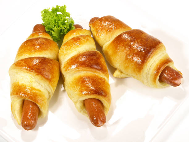 istock Sausage Rolls in Puff Pastry - Fast Food isolated on white Background 1776257631