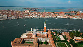 San Giorgio Maggiore island of Venice, Aerial view of Venice Italy, Drone shot of Venice architecture and canal, Aerial view of Rialto Bridge