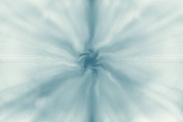 Monotone abstract image that looks like blue-gray plasma light radiating out on a white background.