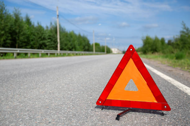 istock Red triangle emergency stop sign on asphalt road. Nobody 1776291827