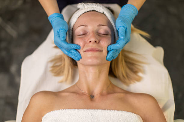 Young woman having skin treatment Young woman having skin treatment