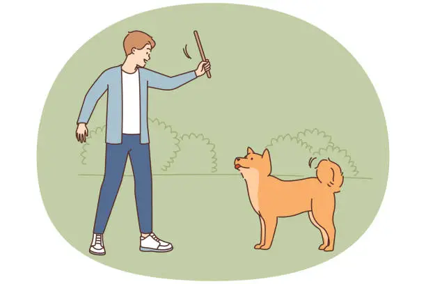 Vector illustration of Smiling man training with dog in park