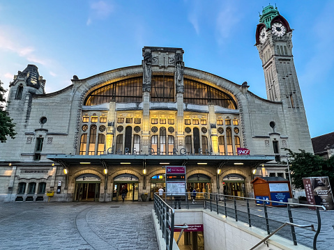 Rouen, France - June 29, 2023: The central train station in Rouen illuminated at night