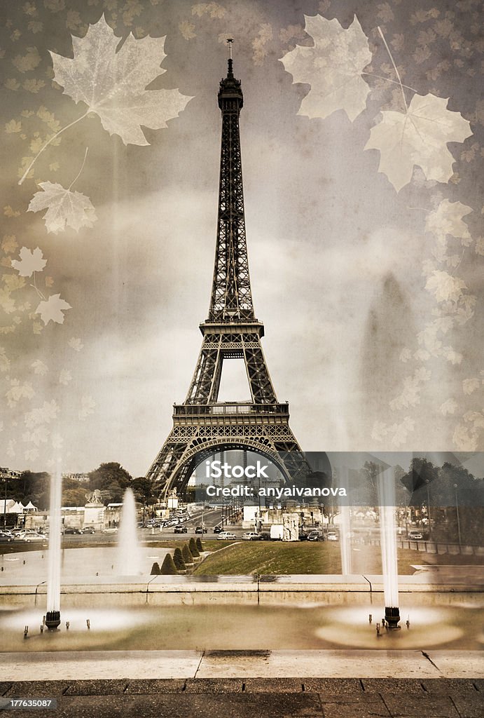 Seasonal picture of Eiffel tower in Paris Aged photo of Eiffel Tower in Paris with autumn leaves. Retro style, vintage paper texture Antique Stock Photo