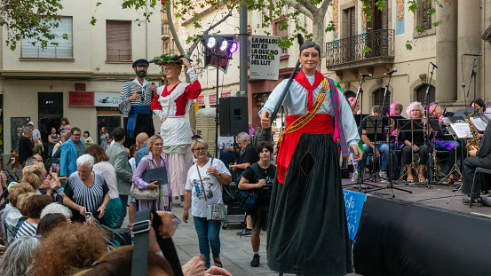 Sitges, Catalonia / Spain - June 11, 2017: Cheerful people wearing costume on pride parade in Sitges