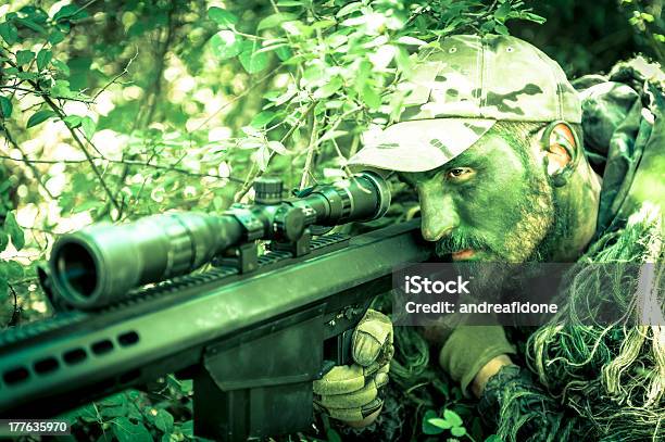 Sniper Hiding In Ghillie Suit Aiming Barrett Precision Rifle Stock Photo - Download Image Now - iStock Sniper Hiding In Ghillie Suit Aiming Barrett Precision Rifle Stock Photo - Download Image Now - iStock