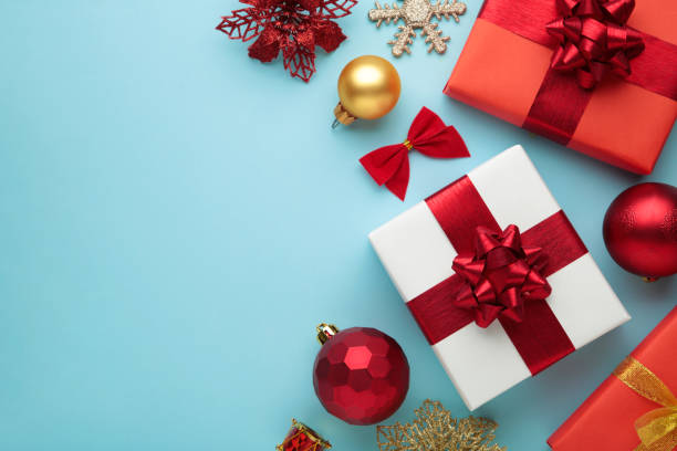 istock Christmas composition. Gifts, red decorations on blue background. New year concept. 1776396535