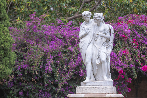 sculptures at Jardín de Monforte, a neo-classical-style city park in the Spanish city of Valencia. The public garden has many fountains and marble sculptures; Valencia, Spain