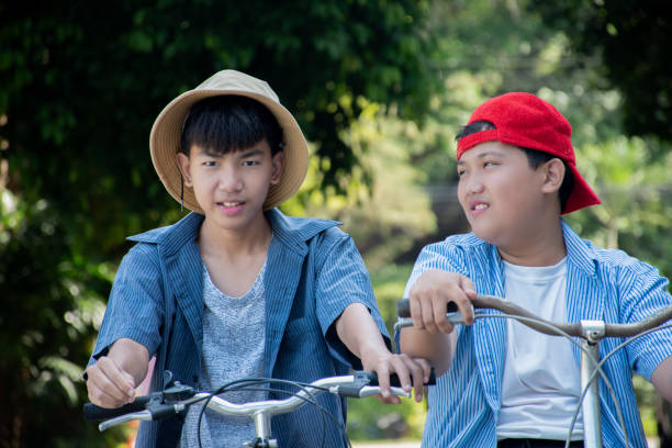istock Asian cute boy riding bicycle 1776433440