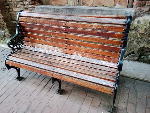 vintage bench in outdoor. exterior wooden seat.
