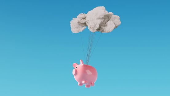 Pink piggy bank is connect with strings to a cloud and flys high in the air.  Concept of saving money online.