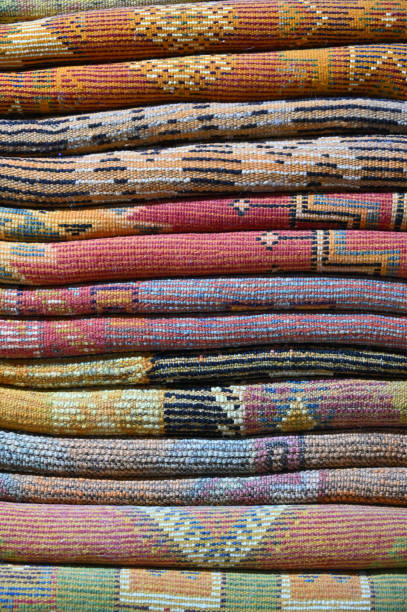 istock Stack of colorful hand-knotted Moroccan carpets 1776466824