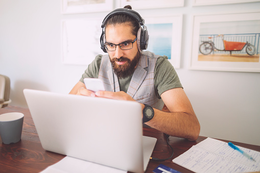 Young man working at home