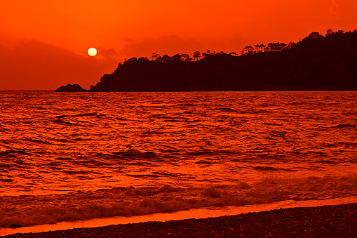 Sunset at sea. Orange sunset.