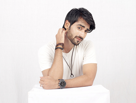 Pakistani Male Model posing in white dress