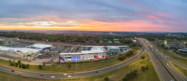 Sunset at Buccleugh Interchange  in Johannesburg with Woodmead Shopping Centre facing the N1 highway.